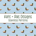 Mallard Duck Watercolor Seamless Pattern with Blue Background: Seamless pattern of watercolor mallard ducks on a light blue background