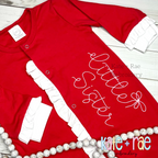 Preppy Little Sister Embroidery Design: The words little sister in white script with a bow on a red ruffled baby gown