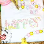 Cupcake Bean Stitch Applique Embroidery Font: The name harper in pastel floral applique letters on a white shirt