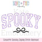 Curved Spooky with Bow Zigzag Stitch Applique Embroidery Design: Design preview of SPOOKY in lavender curved zigzag applique letters with a black bow