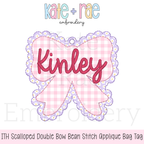 ITH Scalloped Bow Bag Tag Double Bean Stitch Applique Embroidery Design: Design preview of a pink gingham scalloped bow bag tag with the name Kinley