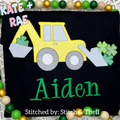 Shamrock Backhoe Sketch Stitch Embroidery Design: Sketch stitch backhoe with green shamrocks above the name Aiden in green on a black shirt