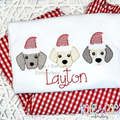 Santa Puppy Trio Sketch Stitch Embroidery Design: Three puppy faces wearing Santa hats above the name Layton in red script on a white shirt