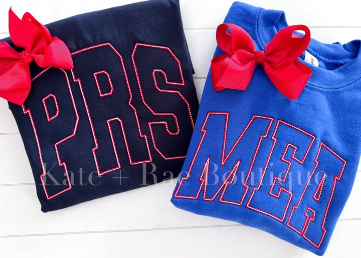 Pike Road & Macon East Sweatshirts: PRS and MEA collegiate letter sweatshirts in navy and royal blue with red hair bows