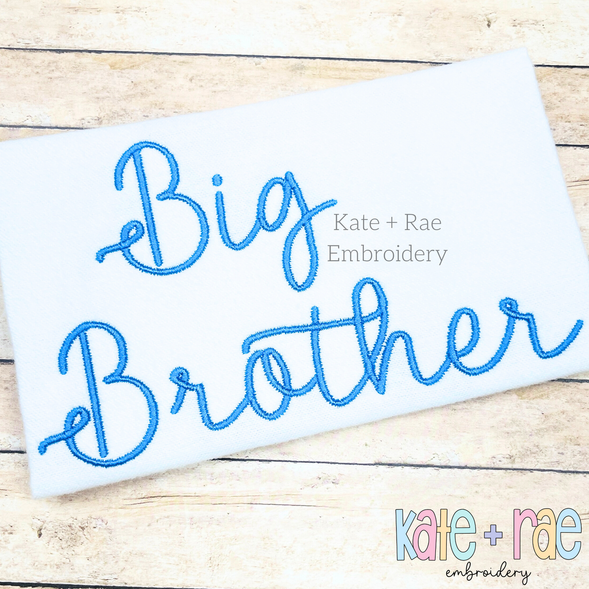 Preppy Big Brother Embroidery Design: The words Big Brother in blue script on white fabric