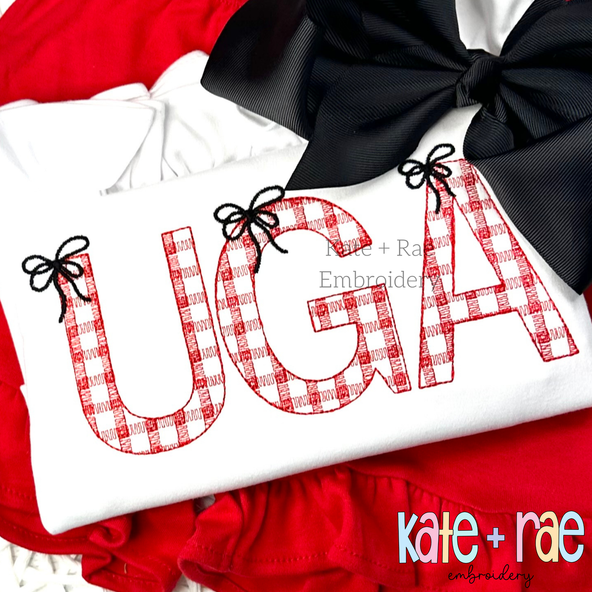 Plaid Embroidery Font with Bows: The letters UGA in red gingham sketch stitch letters with black bows on a white shirt