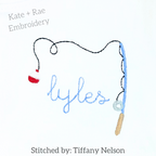 Fishing Pole Mini Fill Embroidery Design: Blue fishing pole frame with a red bobber around the name lyles in blue script on white fabric