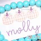 Girl's Plaid Filled Pumpkins with Bows Sketch Embroidery Design: Three peach plaid pumpkins with bows above the name molly in purple script on a white shirt