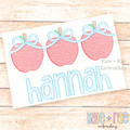 Girl's Apple Trio with Connecting Bows Sketch Stitch Embroidery Design: Three red sketch stitch apples linked by light blue bows above the name hannah on a white shirt