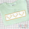 Deer Antler Sketch Stitch with Satin Applique Patch Embroidery Design: Three tan deer antlers on a satin applique patch on a mint shirt