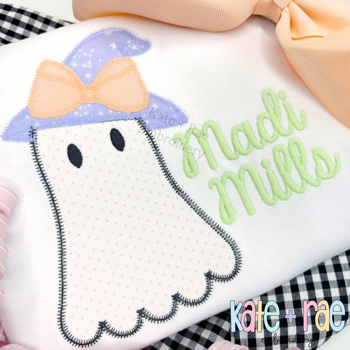 Girls Ghost with Witch Hat Zigzag Stitch Applique Embroidery Design: Polka dot ghost zigzag applique with a lavender witch hat and peach bow beside the name Madi Mills in green