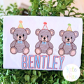 Boy's Teddy Bear Birthday Trio Sketch Stitch Embroidery Design: Three sketch teddy bears with party hats above BENTLEY in blue on a white shirt