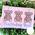 Girl's Teddy Bear Birthday Trio Sketch Stitch Embroidery Design: Three sketch teddy bears with party hats above Birthday Girl in lavender script on a pink shirt