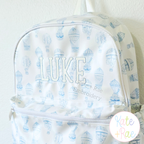 Jellybean Fill Stitch with Bean Border Machine Embroidery Font: LUKE in white Jellybean letters on a hot air balloon print backpack