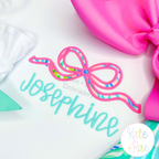 Flowy Longtail Bow Satin Stitch Applique Embroidery Design: Pink and bright print flowy bow satin applique above the name Josephine in aqua script