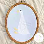 Goose Mini Fill Embroidery Design: White mini fill goose in an embroidery hoop