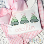 Girls Sketch Stitch Christmas Tree Trio with Satin Stitch Outline Embroidery Design: Three green sketch Christmas trees with satin outlines and pink bows above the name cecilia in pink script