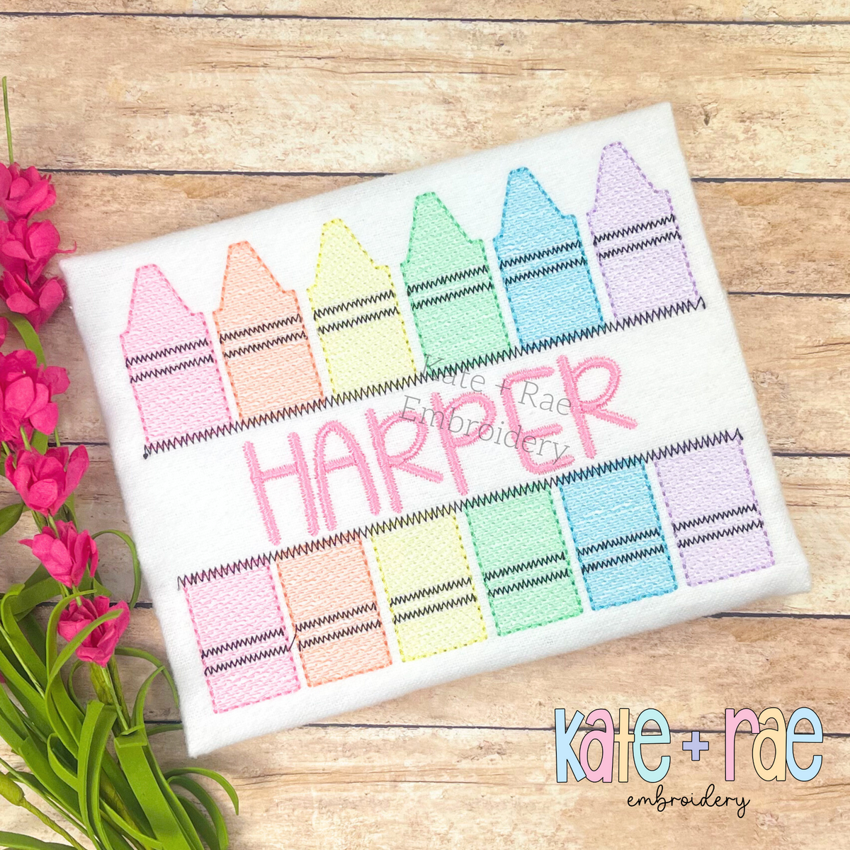 Split Crayon Sketch Stitch Embroidery Design: Pastel sketch stitch split crayons framing the name HARPER in pink on a white shirt