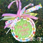 Girls Scalloped Bean Stitch Applique Christmas Ornament In The Hoop Embroidery Design: Green gingham scalloped ornament with personalized pink lettering and polka dot ribbons