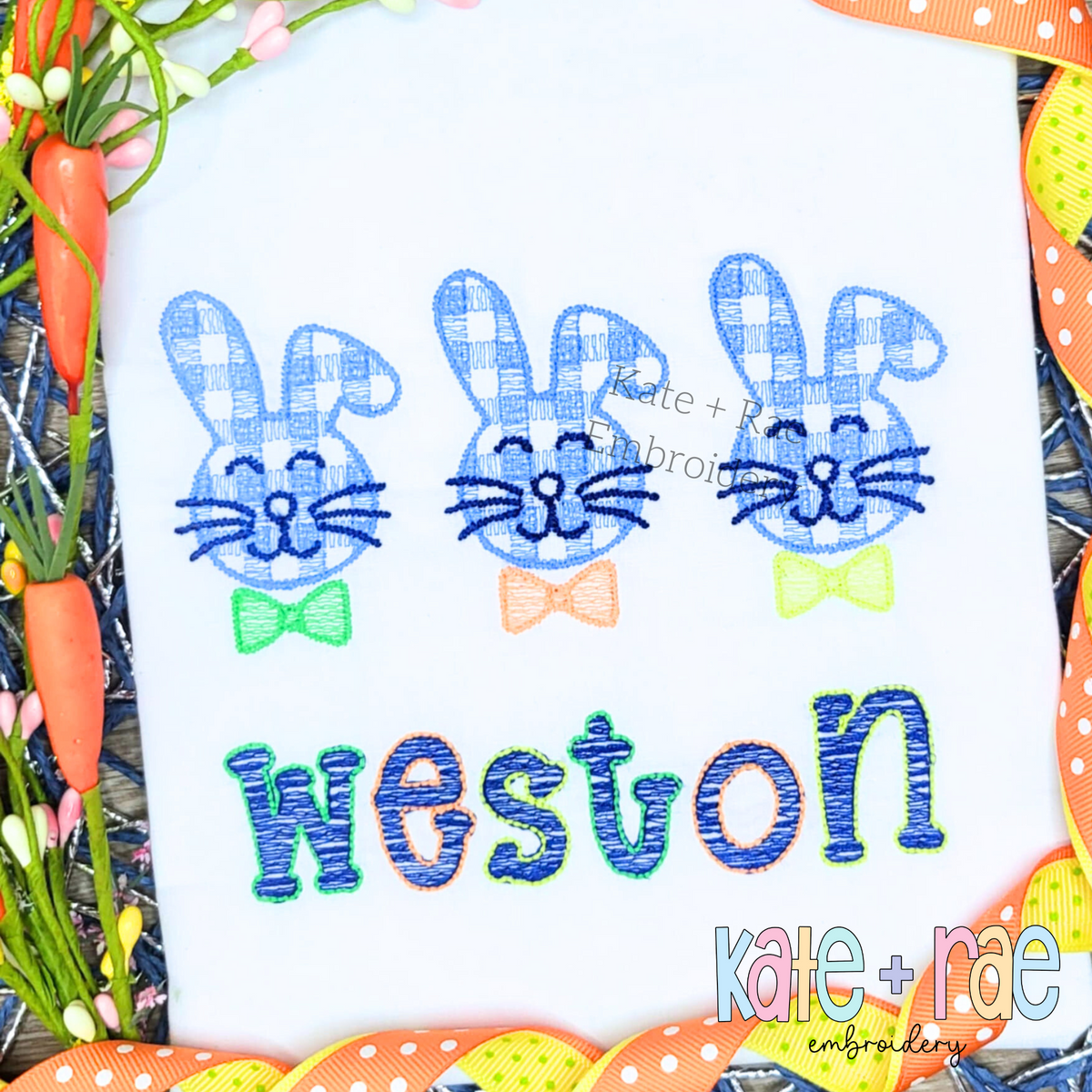 Boy's Plaid Fuzzy Easter Bunny Trio Sketch Stitch Embroidery Design: Three gingham fuzzy bunnies with green, orange, and green bow ties above the name Weston in blue on a white shirt
