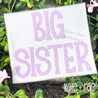 Gracie Faux French Knot Motif Fill Stitch Embroidery Font: BIG SISTER in lavender faux French knot block letters on a white shirt