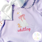 Girl Goose Sketch Stitch with Bow Embroidery Design: White sketch goose with a pink bow above the name whitley in pink on a lavender shirt