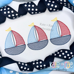 Sailboat Trio Sketch Stitch Embroidery Design: Three red and navy sketch stitch sailboats on a white shirt