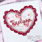 Scalloped Double Heart Bean Stitch Applique Embroidery Design: Red scalloped heart applique with floral center and the name Raelynn in red script on a white shirt