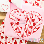 Heart Monogram Zigzag Stitch Applique Embroidery Design: Heart shaped monogram SJR in heart print zigzag applique on a pink shirt