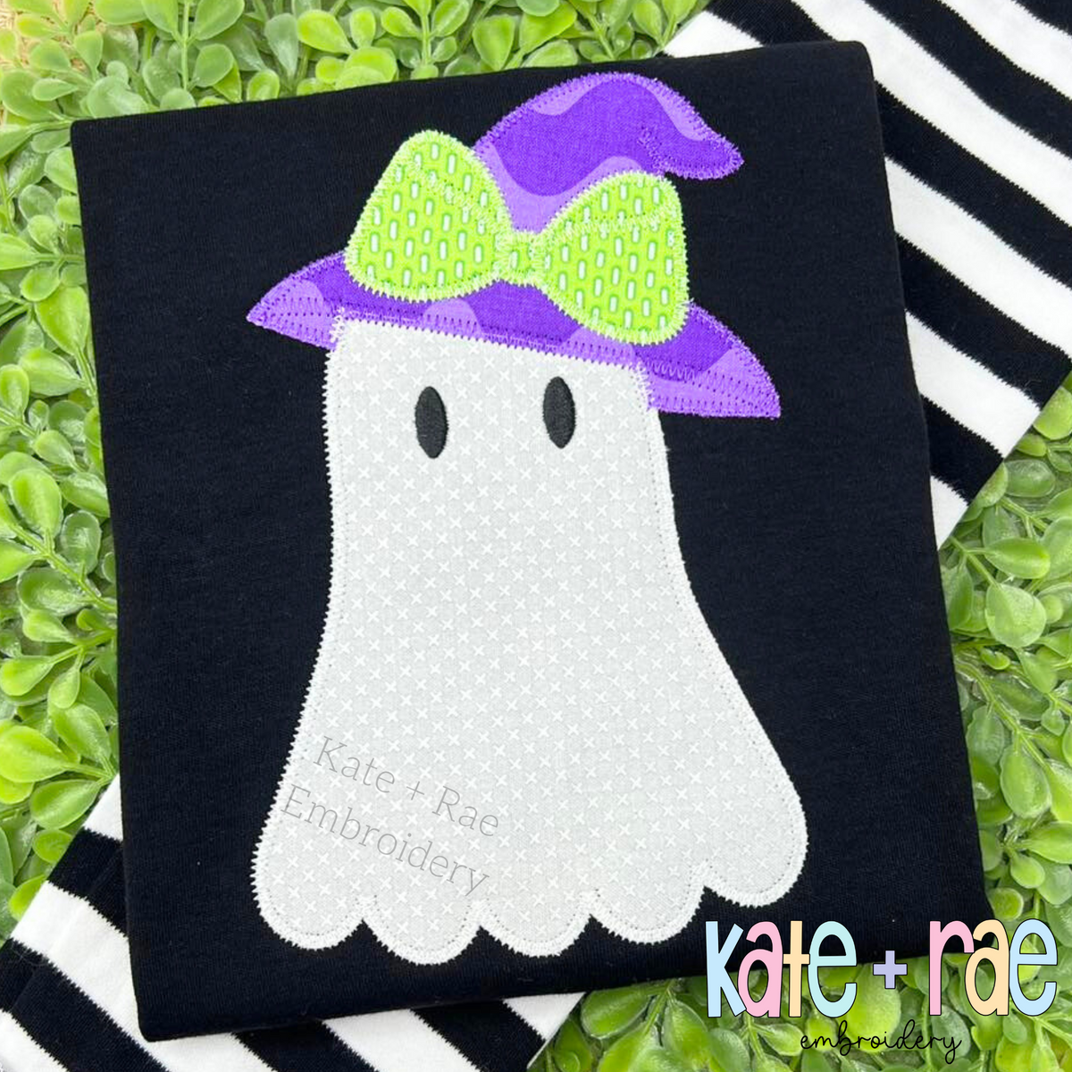 Girls Ghost with Witch Hat Zigzag Stitch Applique Embroidery Design: White ghost applique with a purple striped witch hat and lime bow on a black shirt