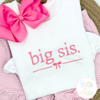 Big Sis with Bow Satin Stitch Embroidery Design: Big sis. in pink satin lettering with a bow and line on a white shirt