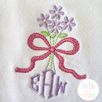 Daisy Floral Bow Mini Satin Stitch Embroidery Design: Purple flower bouquet with a pink bow above an EAW monogram in purple