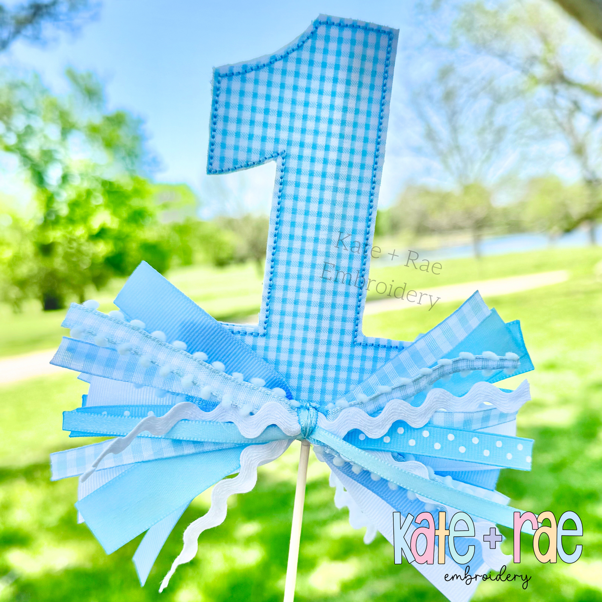 Birthday Numbers Bean Stitch Applique Embroidery Design: Light blue gingham number 1 applique cake topper with blue ribbons