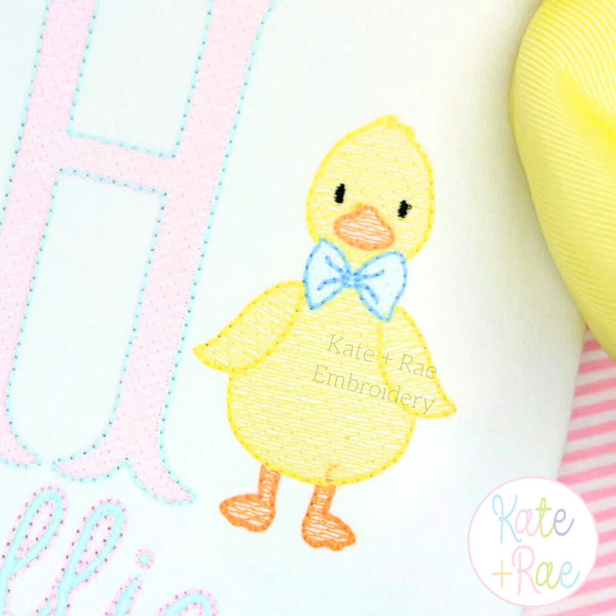Duck with Bow Tie Sketch Stitch Embroidery Design: Yellow sketch duck with a blue bow tie beside a pink letter H on a white shirt