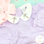 Cross Stitch Mini Cross with Bow Embroidery Design: Mini cross stitch crosses with bows on the white collar of a lavender striped dress