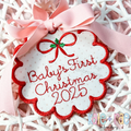 ITH Scalloped Circle Bag Tag Satin Stitch Applique Embroidery Design: Red scalloped circle ornament tag reading Baby's First Christmas 2025 with a red bow
