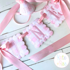 Scalloped Square ITH Banner Bean Stitch Applique Embroidery Design: Pink gingham scalloped square banners spelling ONE with pink ribbons