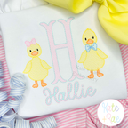 Girl Duck with Bow Sketch Stitch Embroidery Design: Close-up of a pink letter H with two sketch ducks above the name Hallie in blue