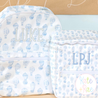 Jellybean Fill Stitch with Bean Border Machine Embroidery Font: LUKE and LPJ in blue Jellybean fill stitch on a hot air balloon print backpack and lunchbox