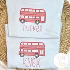 Double Decker Bus Sketch Stitch Embroidery Design: Two light blue shirts with red double decker buses named TUCKER and KNOX