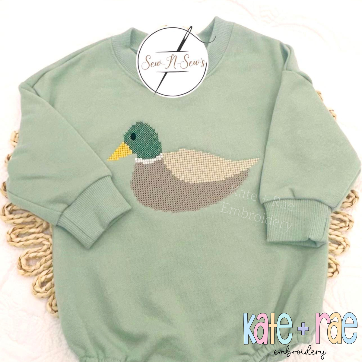Mallard Duck Cross Stitch Embroidery Design: Mallard duck cross stitch on a sage green sweatshirt romper