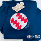 Baseball/Softball Zigzag Stitch Applique Embroidery Design: White baseball applique with red glitter stitching on a navy sweatshirt