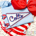 Scalloped Pennant Flag Satin Stitch Applique Embroidery Design: Scalloped pennant flag applique with Colts in navy script on a light blue shirt