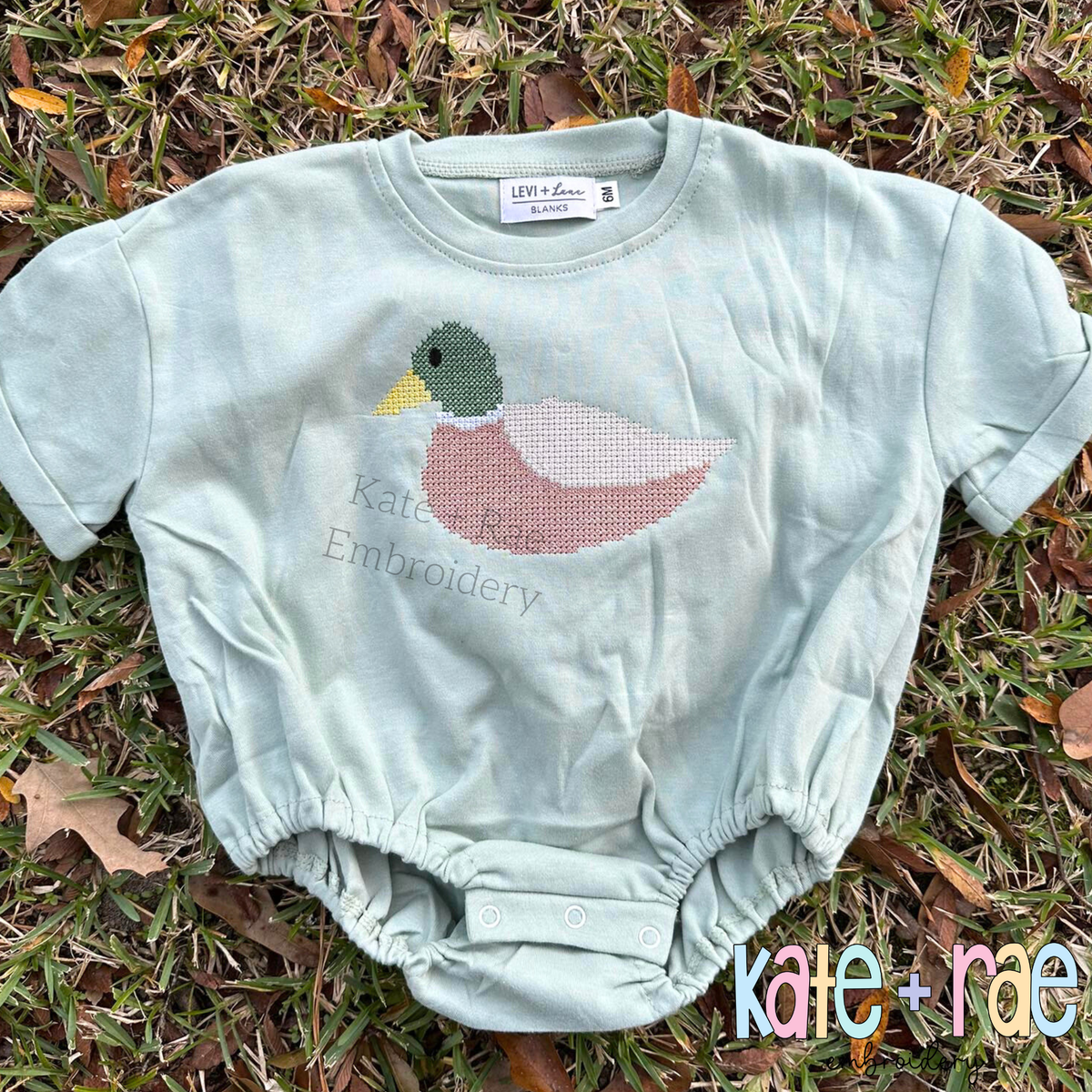 Mallard Duck Cross Stitch Embroidery Design: Mallard duck cross stitch on a mint bubble romper