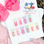 Peeps Sketch Stitch Embroidery Design: Pastel sketch stitch Peeps bunnies spelling MARY CLARKE in pink on a white shirt