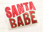 Santa Babe Satin Stitch Applique Embroidery Design: The words Santa Babe in red glitter applique letters with a green outline