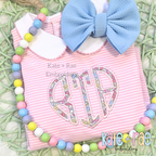 Heart Monogram Satin Stitch Applique Embroidery Design: Heart shaped monogram BJA in pastel floral applique on a pink striped dress