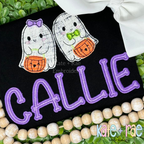 Bones Satin Stitch Applique Embroidery Font: Two ghosts holding jack-o-lantern buckets above the name CALLIE in purple applique letters on a black shirt
