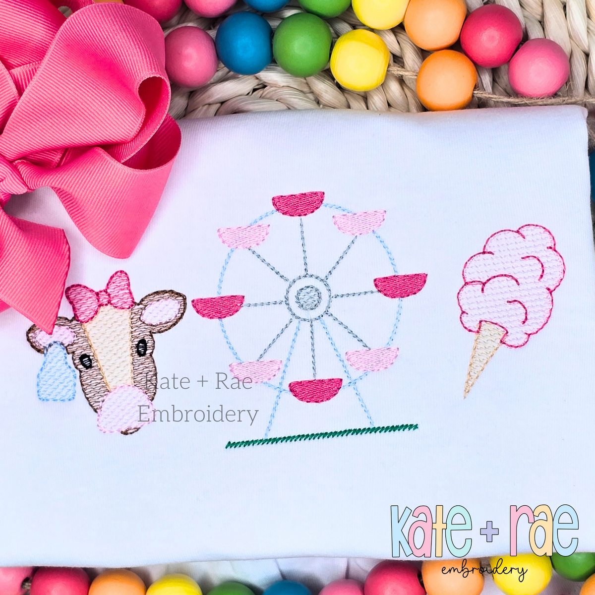 Girl's Fair with Cow Trio Sketch Stitch Embroidery Design: Cow with a pink bow, Ferris wheel, and cotton candy in sketch stitch on a white shirt