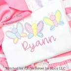 Butterfly Trio Sketch Stitch Embroidery Design: Three pastel sketch stitch butterflies above the name Ryann in pink script on a white shirt